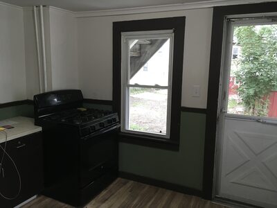 The rear room is the kitchen